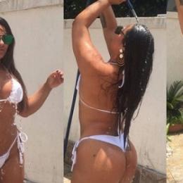 Calor do verão carioca obriga Mulher Melancia tomar banho de mangueira