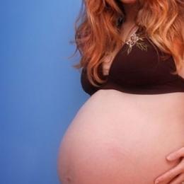 Como a gravidez afeta o corpo de uma mulher?