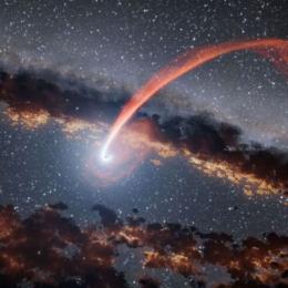 NASA destaca imagem do rastro luminoso de estrela que passou por um buraco negro