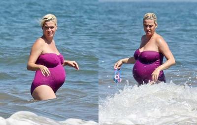 Katy Perry exibe barrigão ao curtir dia de praia em Malibu