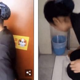 Zeladora bebe água do banheiro para demonstrar como está limpo
